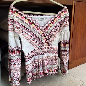 Long sleeve,sits just over the shoulders beautiful embroidery &perfect condition